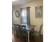 Inviting dining area with wood floors, a classic table, and tasteful decorations at 2235 20Th St S, St Petersburg, FL 33712