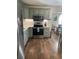 Well-equipped kitchen with stainless steel appliances, modern cabinetry, and stylish backsplash at 2235 20Th St S, St Petersburg, FL 33712