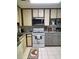 Practical kitchen featuring modern appliances, ample counter space, and bright lighting at 2700 Bayshore Blvd # 2308, Dunedin, FL 34698