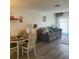 Inviting living room and dining area with modern flooring and natural light at 2700 Bayshore Blvd # 2308, Dunedin, FL 34698