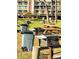 Outdoor communal area with grills and picnic tables for residents to enjoy at 2700 Bayshore Blvd # 2308, Dunedin, FL 34698