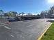 Large outdoor parking lot with covered parking and ample spaces at 2700 Bayshore Blvd # 2308, Dunedin, FL 34698