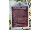 Close-up of a bocce ball rules sign with detailed game regulations at 2700 Bayshore Blvd # 2308, Dunedin, FL 34698