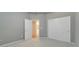 Bedroom showing closet, carpeting, and door to bathroom at 3904 Executive Cir, Plant City, FL 33566