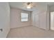 Bedroom featuring a window, closet, and neutral carpet at 3904 Executive Cir, Plant City, FL 33566