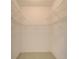 Empty walk-in closet with wire shelving units installed for maximum storage at 3904 Executive Cir, Plant City, FL 33566