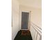 Apartment front door with decorative security screen and welcome mat in hallway at 3934 37Th S St # 36, St Petersburg, FL 33711