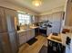 A well-lit kitchen with stainless steel appliances and modern backsplash at 3934 37Th S St # 36, St Petersburg, FL 33711
