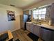 The kitchen features stainless steel appliances and lots of sunlight at 3934 37Th S St # 36, St Petersburg, FL 33711