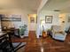 The living room shows hardwood floors and an open doorway to the kitchen at 3934 37Th S St # 36, St Petersburg, FL 33711