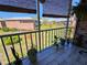 Screened patio provides a serene view of the grassy lawn and neighboring brick building at 3934 37Th S St # 36, St Petersburg, FL 33711