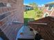 Brick stairwell leads to a green courtyard and apartments at 3934 37Th S St # 36, St Petersburg, FL 33711