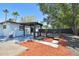 Backyard featuring a modern pergola and adjacent patio area at 3934 Huntington Ne St, St Petersburg, FL 33703