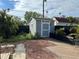 Backyard showing a shed surrounded by mulch at 3934 Huntington Ne St, St Petersburg, FL 33703