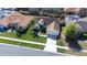Aerial view of a well-maintained home featuring a lush front yard and a long driveway at 4313 Brooke Dr, Valrico, FL 33594