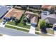 Aerial view showcasing a home's manicured lawn, well-kept landscaping, and long driveway at 4313 Brooke Dr, Valrico, FL 33594