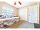 Bedroom features carpet, closet, and natural light at 4313 Brooke Dr, Valrico, FL 33594