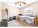 Bedroom with ceiling fan, carpet, and daybed at 4313 Brooke Dr, Valrico, FL 33594