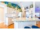 Bright kitchen featuring neutral cabinetry, mosaic countertops, and elevated decor accents at 4313 Brooke Dr, Valrico, FL 33594