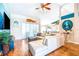 Spacious living room with hardwood floors, vaulted ceilings, and comfortable seating at 4313 Brooke Dr, Valrico, FL 33594