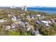 Aerial view of a waterfront property nestled among lush greenery and mature trees with water views at 4603 S Bartlett St, Tampa, FL 33611
