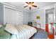 Bright bedroom with a ceiling fan, window and a comfortable bed at 4603 S Bartlett St, Tampa, FL 33611