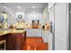 Modern kitchen features stainless steel appliances, custom cabinetry, and a wine rack at 4603 S Bartlett St, Tampa, FL 33611