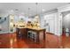 Well-appointed kitchen featuring a large island with seating, modern appliances, and abundant storage at 4603 S Bartlett St, Tampa, FL 33611