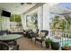 Relaxing screened lanai with comfortable seating and dining area, perfect for outdoor enjoyment at 4603 S Bartlett St, Tampa, FL 33611
