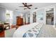 An elegant main bedroom with wood floors and multiple walk-in closets at 4603 S Bartlett St, Tampa, FL 33611
