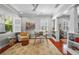 Bright office with a glass desk, neutral rug, ample natural light, and modern decor at 4603 S Bartlett St, Tampa, FL 33611