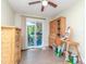 Bedroom with an outdoor patio, natural lighting, and wooden furnishings at 5029 29Th S Ave, Gulfport, FL 33707