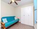 Bedroom featuring a futon, wardrobe and a window with natural light at 5029 29Th S Ave, Gulfport, FL 33707