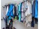 Walk in closet with wire rack and lots of clothing at 5029 29Th S Ave, Gulfport, FL 33707