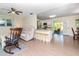 Open-concept living area seamlessly connects the living room, kitchen, and outdoor patio space at 5029 29Th S Ave, Gulfport, FL 33707