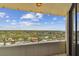 Enjoy breathtaking panoramic views from your private balcony overlooking lush greenery at 5940 Pelican Bay S Plz # 1205, Gulfport, FL 33707