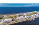 Waterfront condo complex featuring boat docks and beach access with scenic views at 611 Destiny Dr # 304, Ruskin, FL 33570