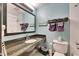 Bathroom featuring a granite countertop, modern fixtures, and coordinated accessories at 611 Destiny Dr # 304, Ruskin, FL 33570