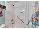 Clean, white tiled bathtub and shower combination at 611 Destiny Dr # 304, Ruskin, FL 33570