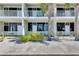 Relaxing condo balconies offer peaceful outdoor seating near lush landscaping at 611 Destiny Dr # 304, Ruskin, FL 33570