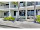 Charming coastal condo with a welcoming front patio and lush tropical landscaping, perfect for relaxation at 611 Destiny Dr # 304, Ruskin, FL 33570