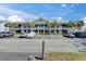 Charming condo with balconies and parking spaces, enhanced by palm trees at 611 Destiny Dr # 304, Ruskin, FL 33570
