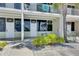 Inviting condo exterior with outdoor seating, perfect for enjoying coastal breezes and serene surroundings at 611 Destiny Dr # 304, Ruskin, FL 33570
