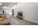Bright and airy living room with a seamless transition to the dining area and kitchen at 6907 N 12Th St, Tampa, FL 33604
