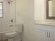 Updated bathroom featuring a tub/shower combination and modern vanity at 7111 N 53Rd St, Tampa, FL 33617