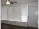 Cozy sunroom featuring many bright windows and wood-look floors at 7111 N 53Rd St, Tampa, FL 33617