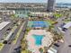 Aerial view of the community pool and tennis courts at 7400 Sun Island Drive S # 712, South Pasadena, FL 33707