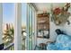 Relaxing balcony offers panoramic city views and unique decor, perfect for enjoying the outdoors at 7400 Sun Island Drive S # 712, South Pasadena, FL 33707
