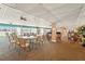 Expansive ballroom with tables and chairs, perfect for hosting gatherings and events at 7400 Sun Island Drive S # 712, South Pasadena, FL 33707