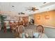 Charming bar area featuring wicker chairs and glass top tables, creating a relaxed atmosphere at 7400 Sun Island Drive S # 712, South Pasadena, FL 33707